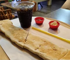 كومبو ] فطيره هوت دوق + مشروب غازي[